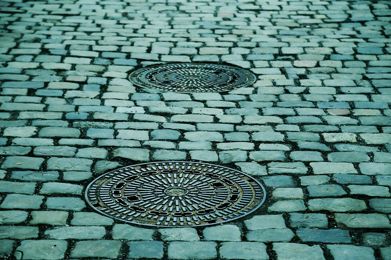 cobblestones, street, manhole covers, manhole, paving stones, pavement, road, ground, cobbblestone street, street, manhole, ground, ground, ground, ground, ground